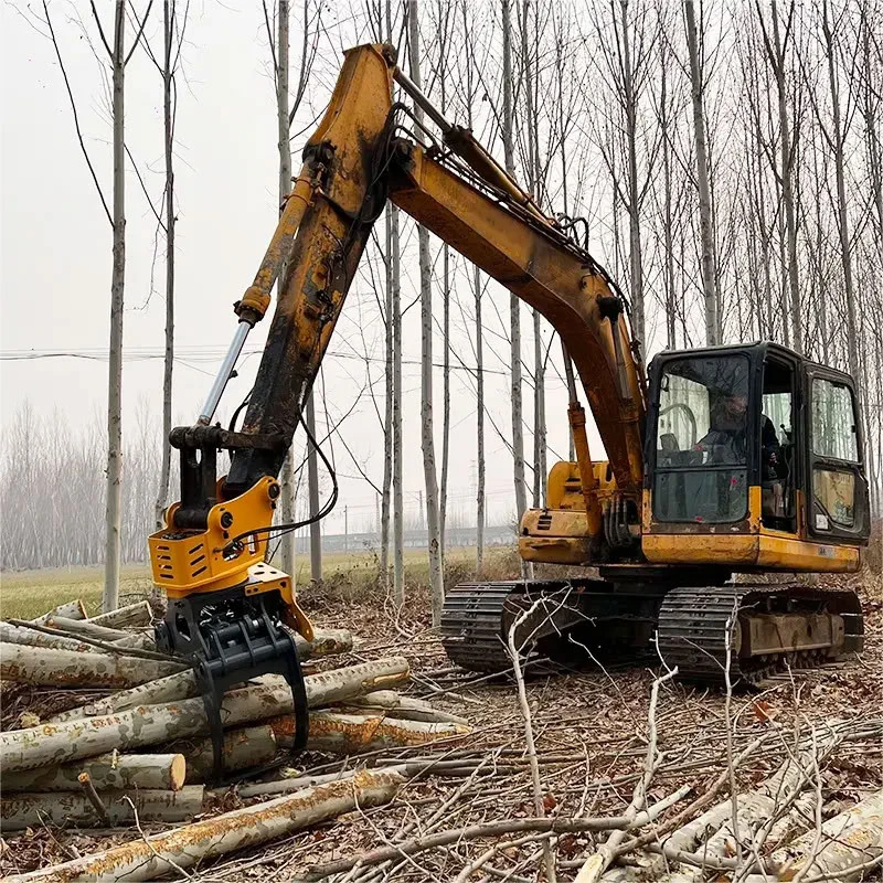 Excavator-mounted grapple saw positioned near cut logs outdoors