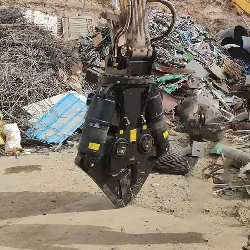 Hydraulic shear positioned among scrap metal