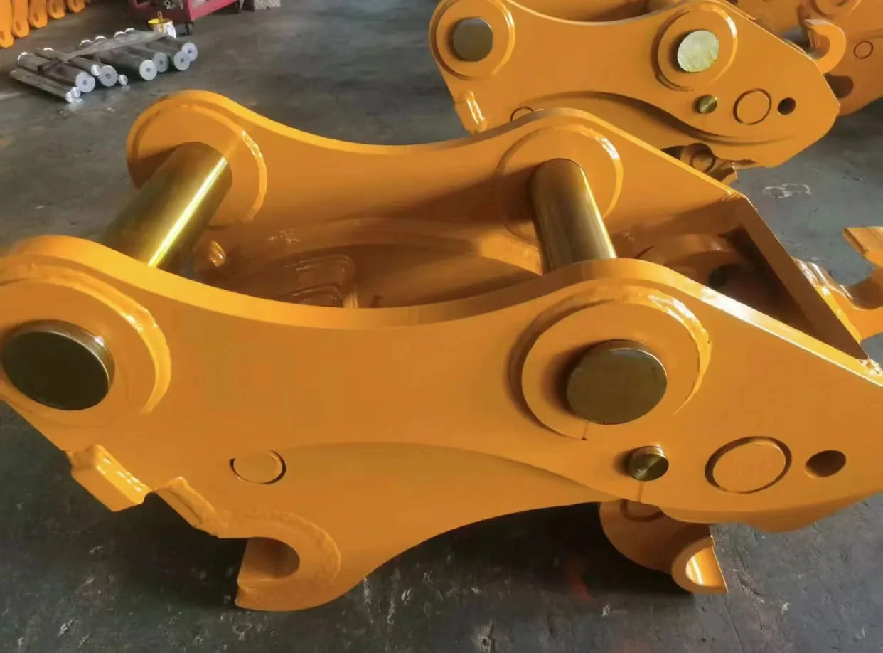 Coupler side plate, pin ends and fasteners in close view
